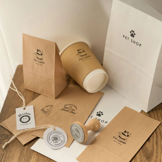 Kraft paper products with a pet-themed design on a wooden surface