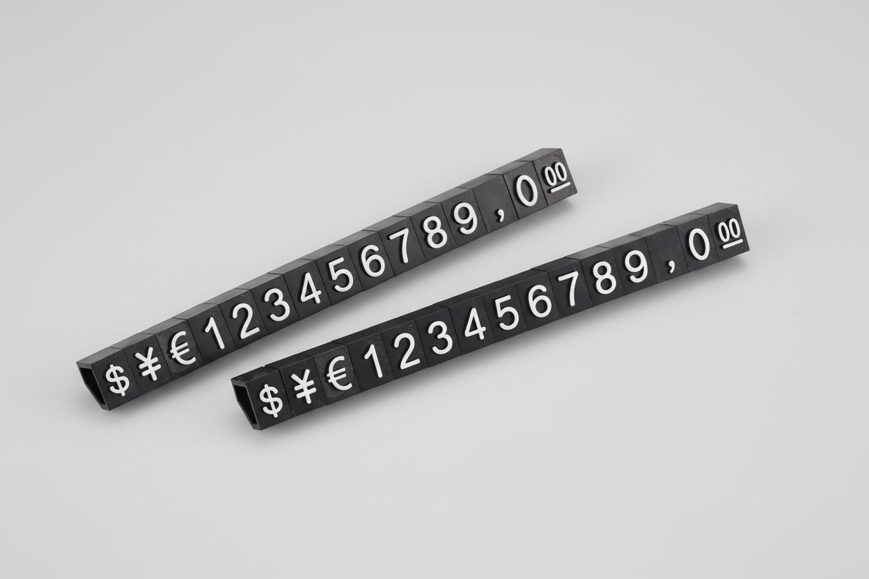 Two black number strips with symbols on a white background