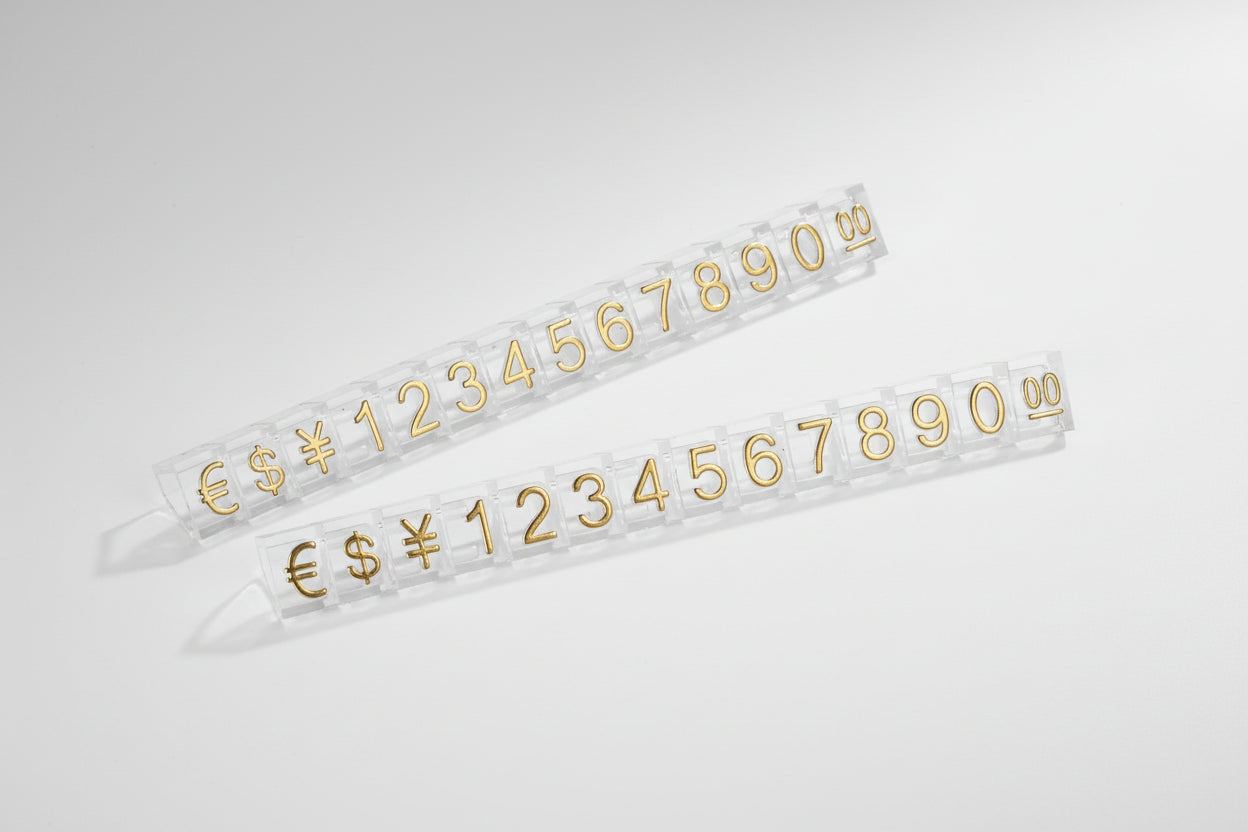 Two white strips with gold numbers 