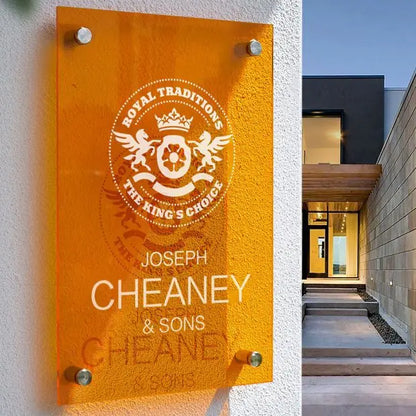 Glass sign with 'Joseph Cheaney & Sons' logo on a building exterior.